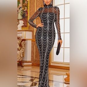 Sheer black mesh dress with silver sequins form fitting
